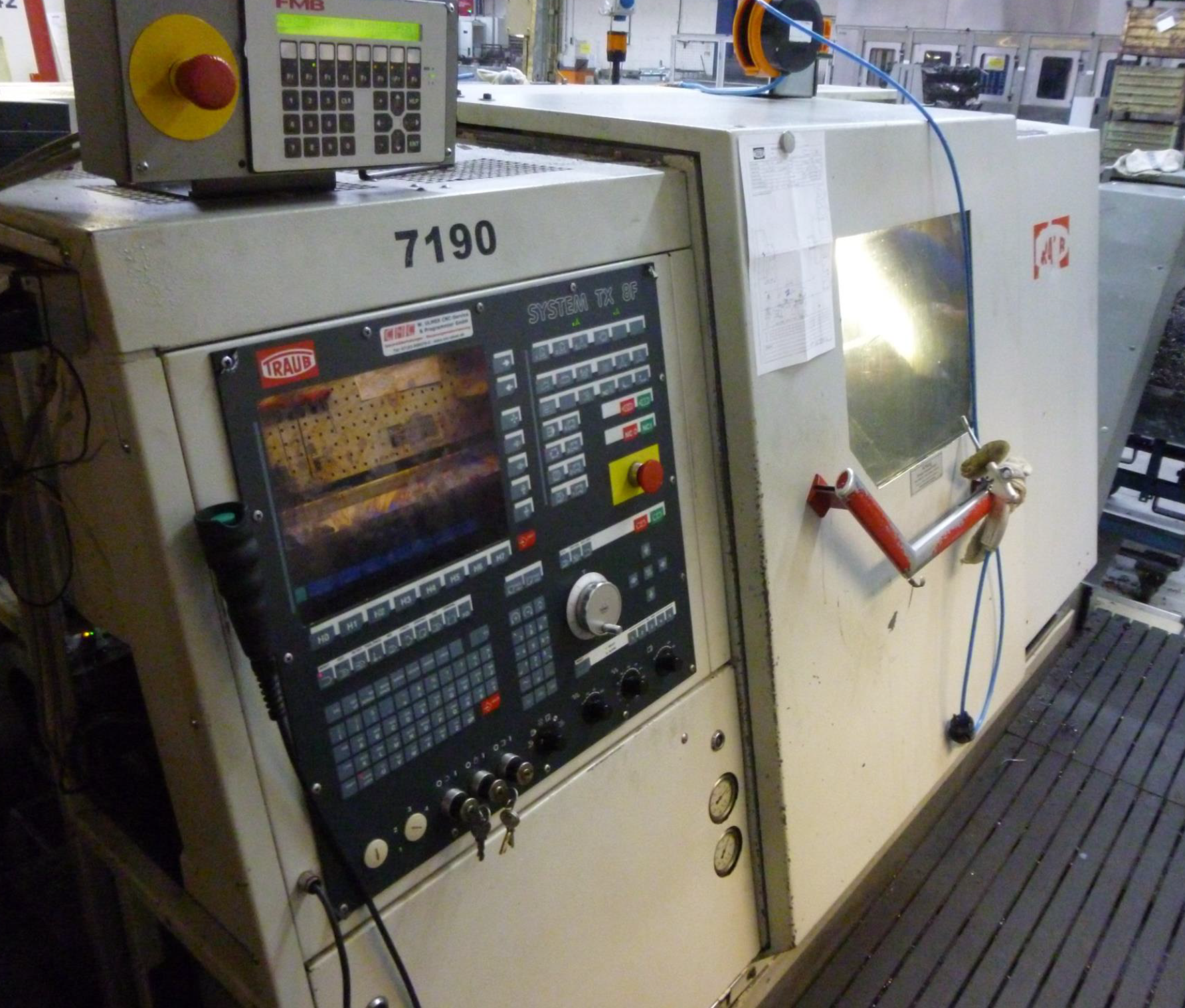 CNC Doppelspindel-Drehmaschine + Lader